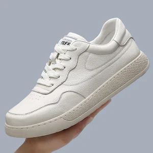 White lace-up leather sneakers with a textured sole